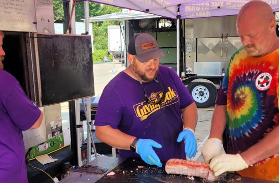 Three people work the grill056627 8219087259112400547 n