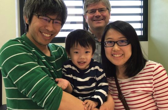 Jayden and his parents celebrate after getting the green light to go home from his doctor.