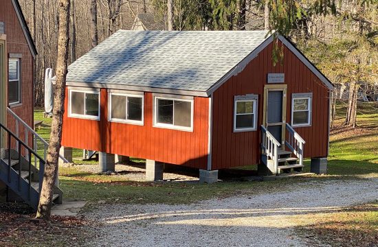 Red cabin in woods