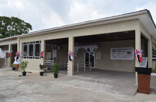 A nice one-story building with ribbons tied around columns.