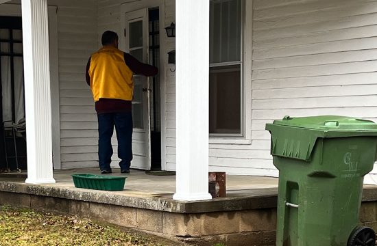 Lions club member knocks on door