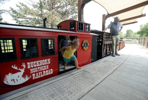 Girl jumps for joy after train ride